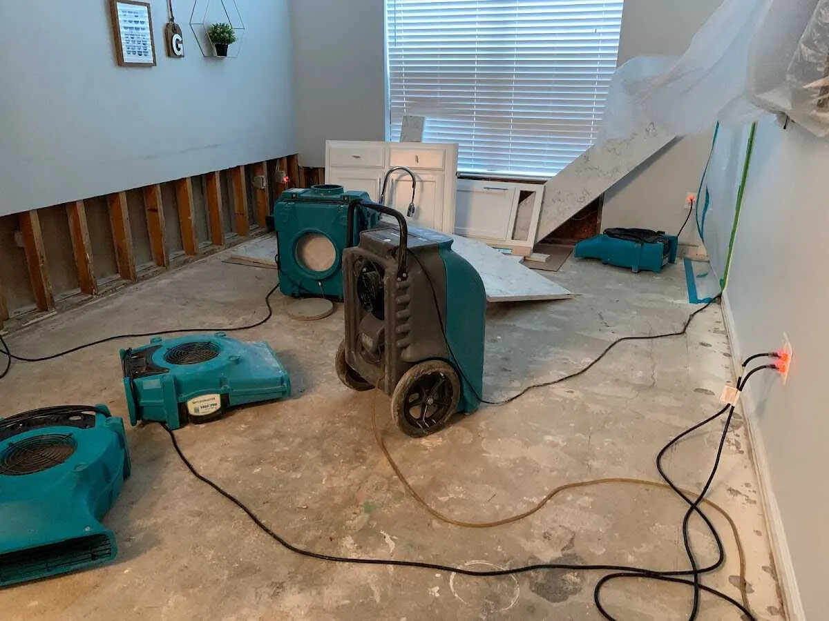 Dehumidifier in flood-cut room for Water Damage Restoration in St. Louis